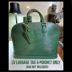 Louis Vuitton Luggage Tag & Poignet Set
In Rare Borneo Green Epi